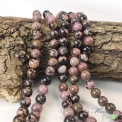 Rhodonite rose et noire en perles rondes 8mm - fil complet