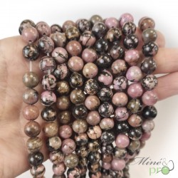 Rhodonite rose et noire en perles rondes 8mm - fil complet